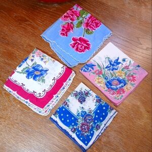 4 vintage 60s ladies handkerchiefs with floral theme.